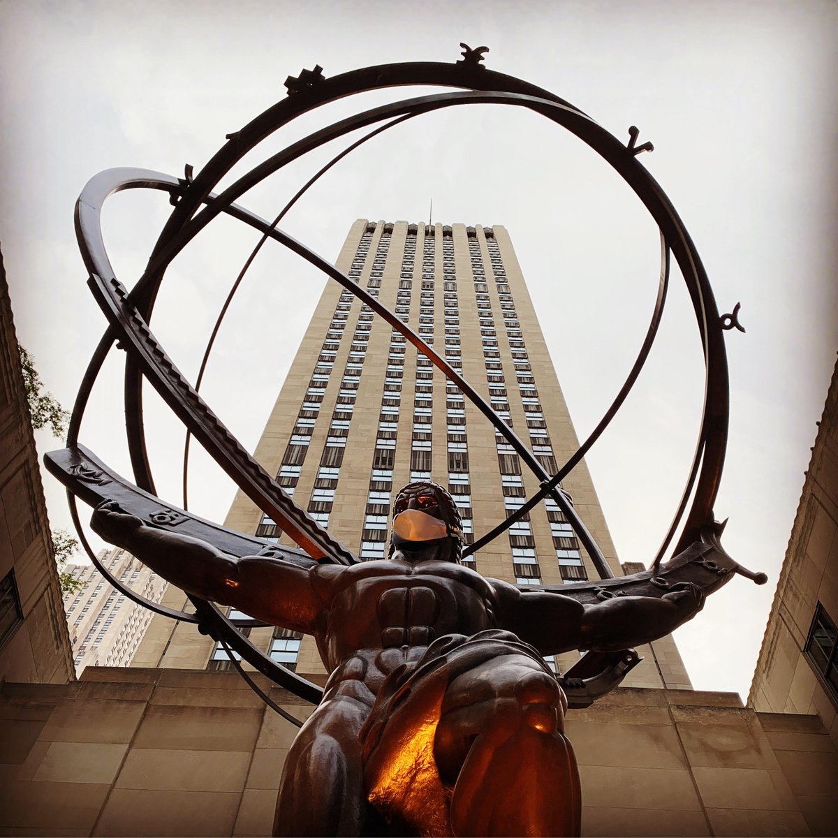 EverGreeneAA's tweet photo. The #AtlasStatue in #NYC looks different than usual! Long before the Atlas wore a mask, #EverGreene #conservators completed extensive treatments on the statue’s surface. Learn more here: https://t.co/n3TVxVqzC7 #Conservation #NewYorkCity #Bronze #WearYourMask @tishmanspeyer https://t.co/FaU5wJaKcx