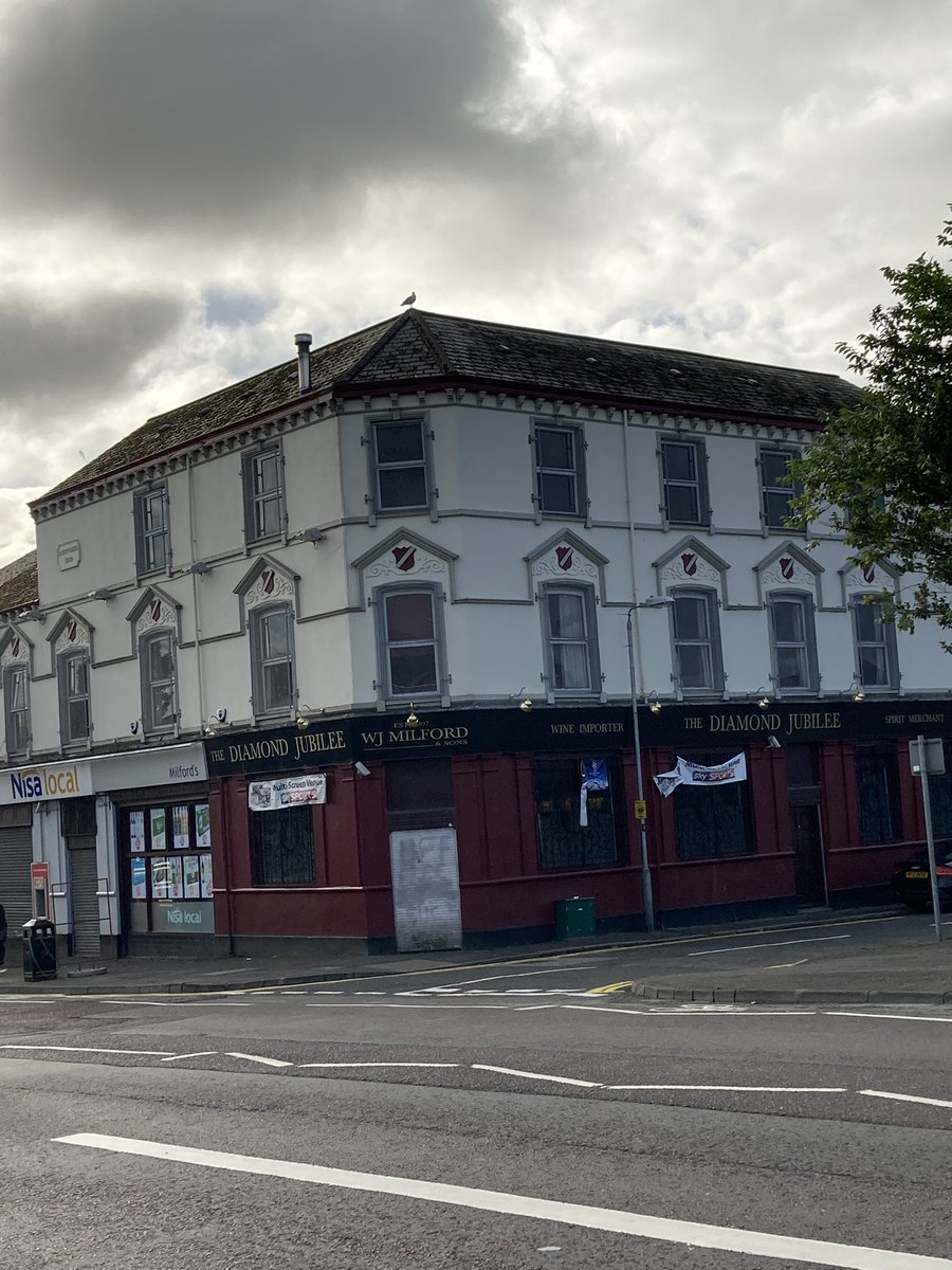5.  #Belfast 1st photo shows a newer block of flats in Brown Square.When being built,graffiti went up saying”No Yuppies here!”.There aren’t any today.2nd photo of the infamous West Link that carved through & destroyed parts of lower Shankill.3rd,Victorian Diamond Jubillee Bar.