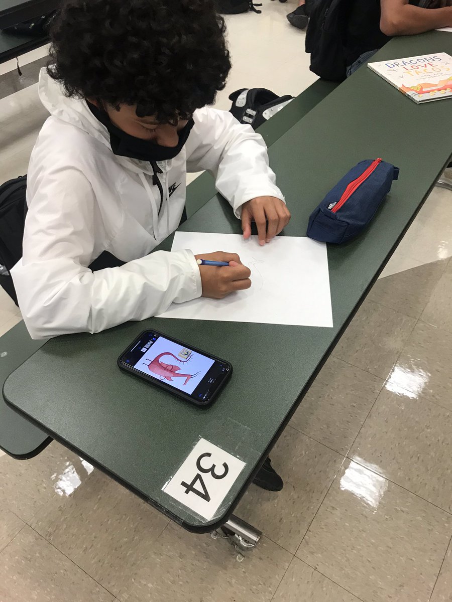 ASeidenberger1's tweet image. “Dragons Love Tacos” read aloud art activity following hearing the book!   Literacy focused Toreador Time for Jim Barnes Middle School students is underway! #ToREADors