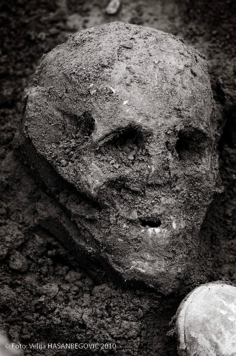 Human remains, skulls, socks with bones, wire, were found. /4