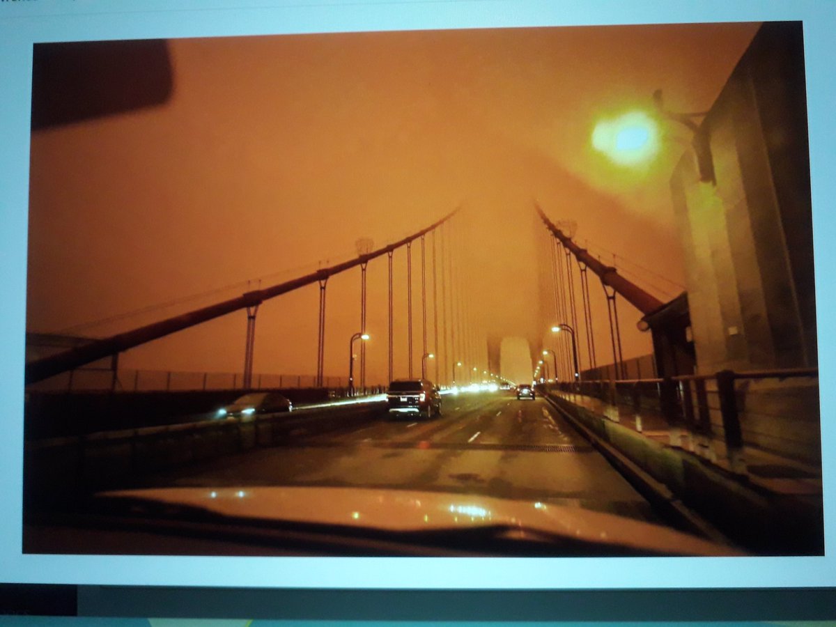 anonnie111's tweet photo. Fellow employee's pic driving across the Golden Gate Bridge at 12:55 pm today.  I don't think this is what they had in mind for naming it the "Golden" Gate Bridge.

Very eerie and terribly sad.
#CaliforniaFires https://t.co/n3b1tJxUbh