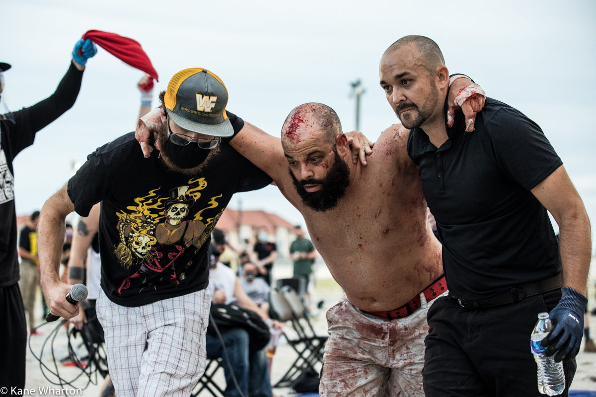 Kane_B13's tweet photo. Candids of wrestlers walking to the back after a #deathmatch. #gcw #tournamentofsurvival. Shlak, Atticus Cogar, Allie Kat, Alex Colon #gcwtos5 https://t.co/TosTZ7U80n