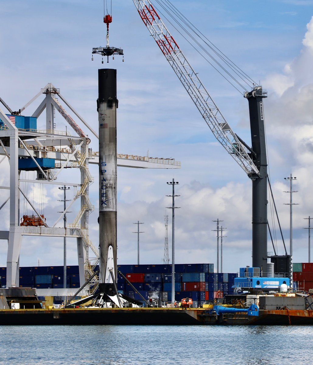 ken_kremer's tweet photo. Hoisting cap attachment by #spacex crane crew started roughly an hour ago to 2x flown #Falcon9 b1060 .2 but has paused now at noon ET today Sep 9 and then just completed 1220pm- beside #gomstree https://t.co/MdlCB9hFpw