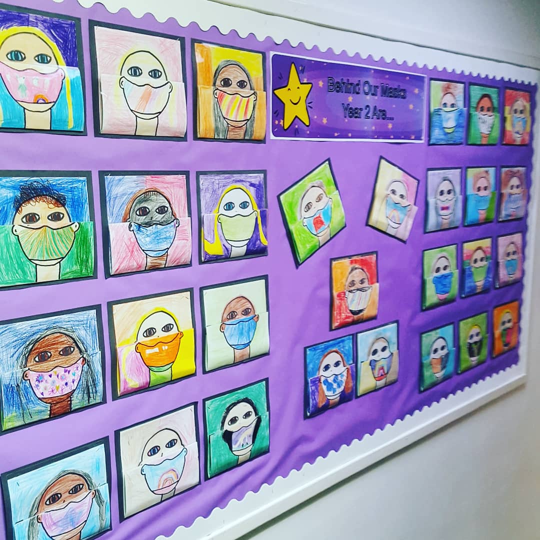 Mr_Walton_'s tweet photo. Pretty happy with my display outside the classroom. The children thought about the smile behind the mask. So good to be back in class! #year2 #teaching #classroom #display https://t.co/QANV6huU3H