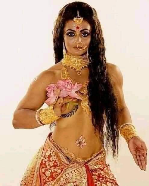 ExMuslimBlogger's tweet photo. Europa Bhowmik is the youngest Indian body builder who did this photoshoot with a get up of Indian Goddess Durga. She was being  highly criticized for this nude pose. what do think about her look? 
#ISimp4Kali #DurgaPuja #Hinduism #atheism https://t.co/WZSI2h1qln