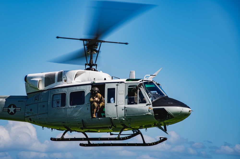 INDOPACOM's tweet image. A UH-1N Iroquois assigned to the @PACAF 459th Airlift Squadron conducts a site survey for an alternate landing zone onboard @CFAY_Japan  #HeloOps #FreeandOpenIndoPacific.