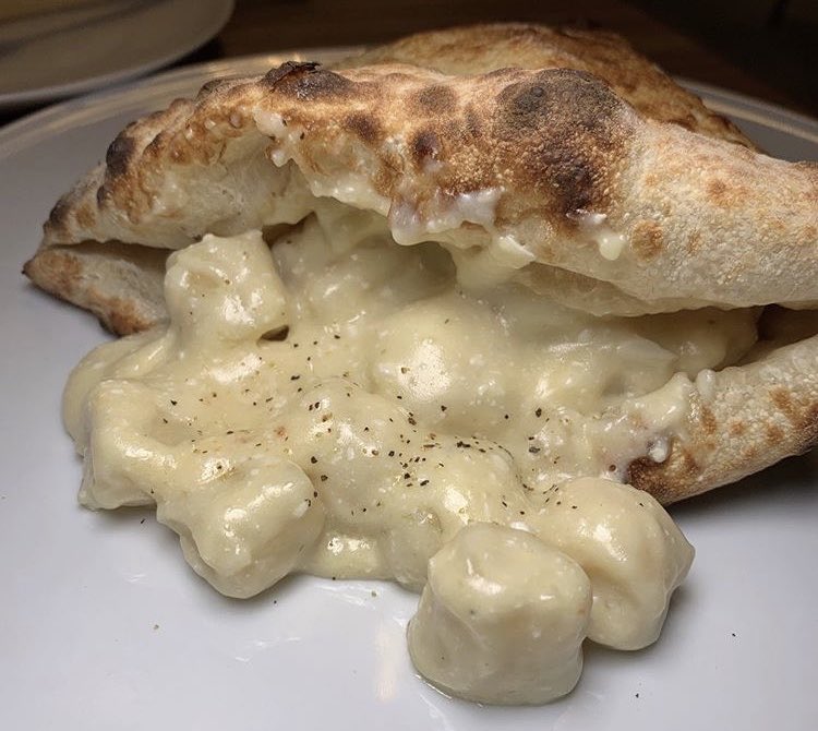 PostPornFood's tweet photo. Four Cheese Gnocchi Calzone https://t.co/10PyN7ouJe