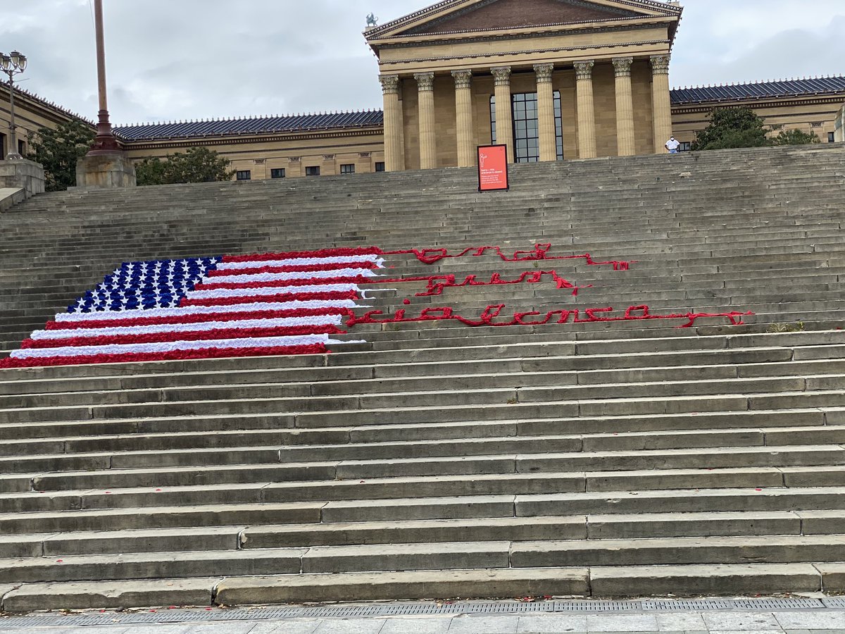 March4Philly's tweet photo. Today we registered voters and participated in an art installation addressing gun violence and poverty in America. @mmhaims_ created the American flag behind us unraveling to spell out “End Gun Violence”. 

#OurPower #VoteForOurLives 
📸: Dylan Eddinger https://t.co/ln4uHoEkyR