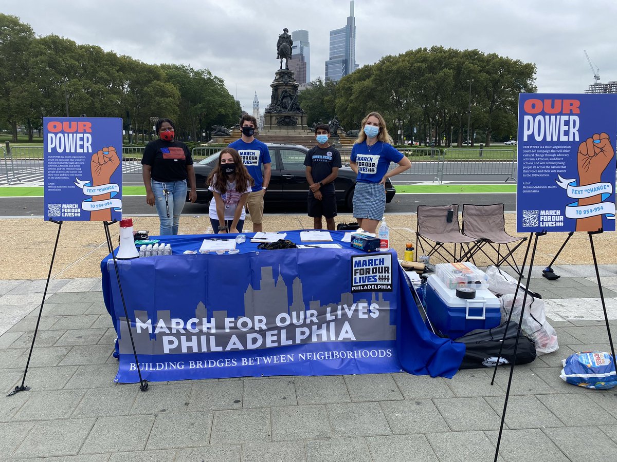 March4Philly's tweet photo. Today we registered voters and participated in an art installation addressing gun violence and poverty in America. @mmhaims_ created the American flag behind us unraveling to spell out “End Gun Violence”. 

#OurPower #VoteForOurLives 
📸: Dylan Eddinger https://t.co/ln4uHoEkyR