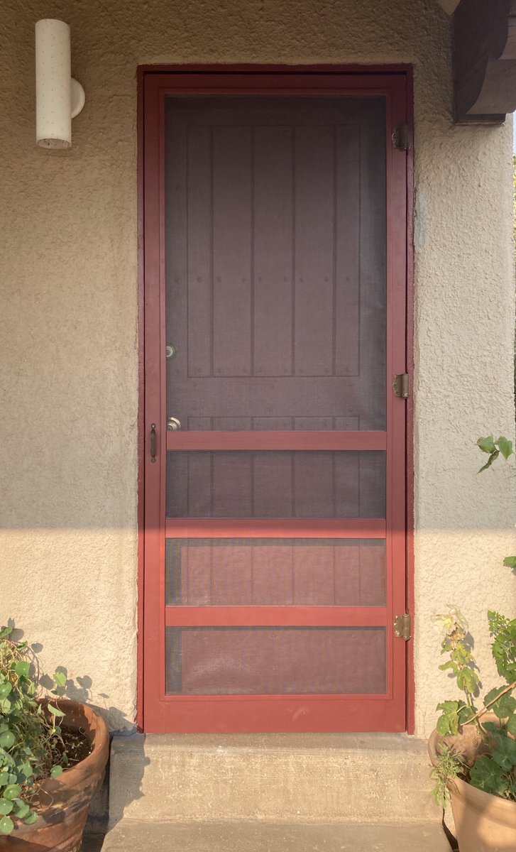 So I had to remove a couple inches from the middle of the door so I could maintain the edge. My entire life is like this.I rehab’d the hardware, changed out the screen, sanded, stained and poly’d the inside and painted the outside. It hung perfectly from its vintage hinges.