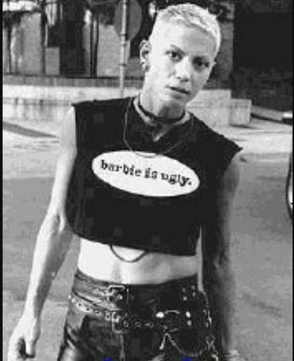 i know joan has never said anything about her sexuality but like . come on . look at this photo .