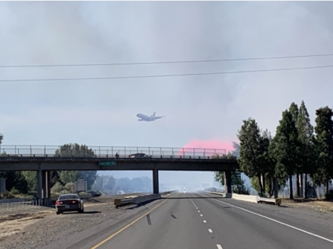 OregonDOT's tweet photo. #SWoregon: I-5 between north #Medford and #CentralPoint interchanges, Exits 30 and 33 is closed due to #wildfire. Avoid the area. Seek alternate routes.

Fire-fighting efforts include multiple retardant and water drops. https://t.co/SsqxkwGpZQ for updates. #swofire https://t.co/4pNt2ufRdy