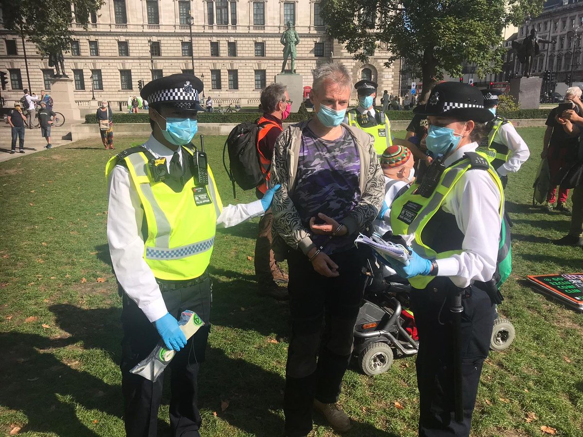 XRebellionUK's tweet image. Welcome to @pritipatel dystopian authoritarian police state, where stewards are arrested setting up the information stall that has been in Parliament Square all week. A few flyers = crime? 

Who are the real criminals? Those who protect the powerful or who #TellTheTruth