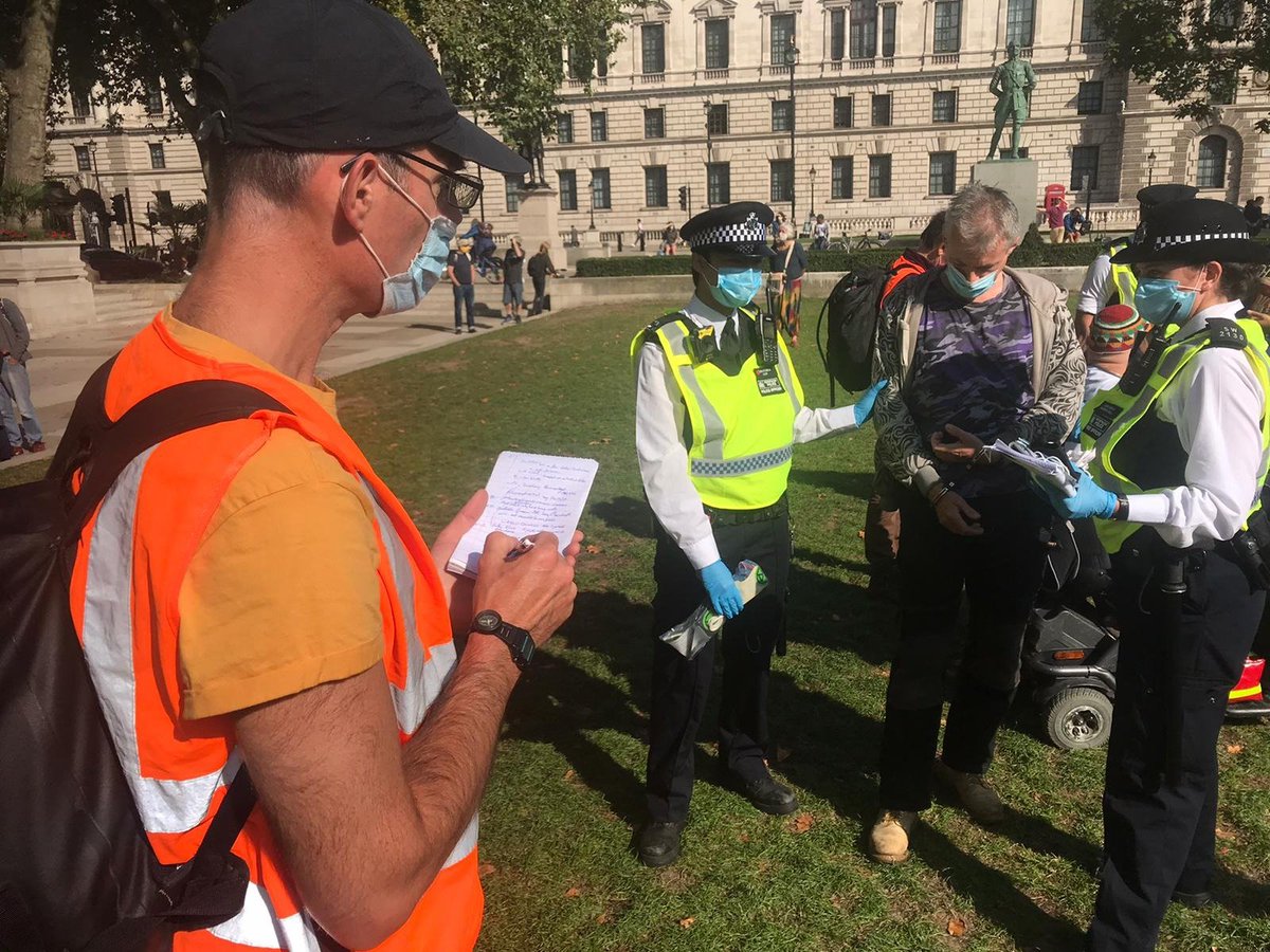 XRebellionUK's tweet image. Welcome to @pritipatel dystopian authoritarian police state, where stewards are arrested setting up the information stall that has been in Parliament Square all week. A few flyers = crime? 

Who are the real criminals? Those who protect the powerful or who #TellTheTruth