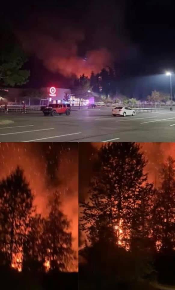 NEW: Huge Fire in Bonney Lake right behind Target in residential areas. A bystander witnessed a couple throw an incendiary device out of their vehicle in brush nearby the Target.  #WestCoastFires  #BonneyLake