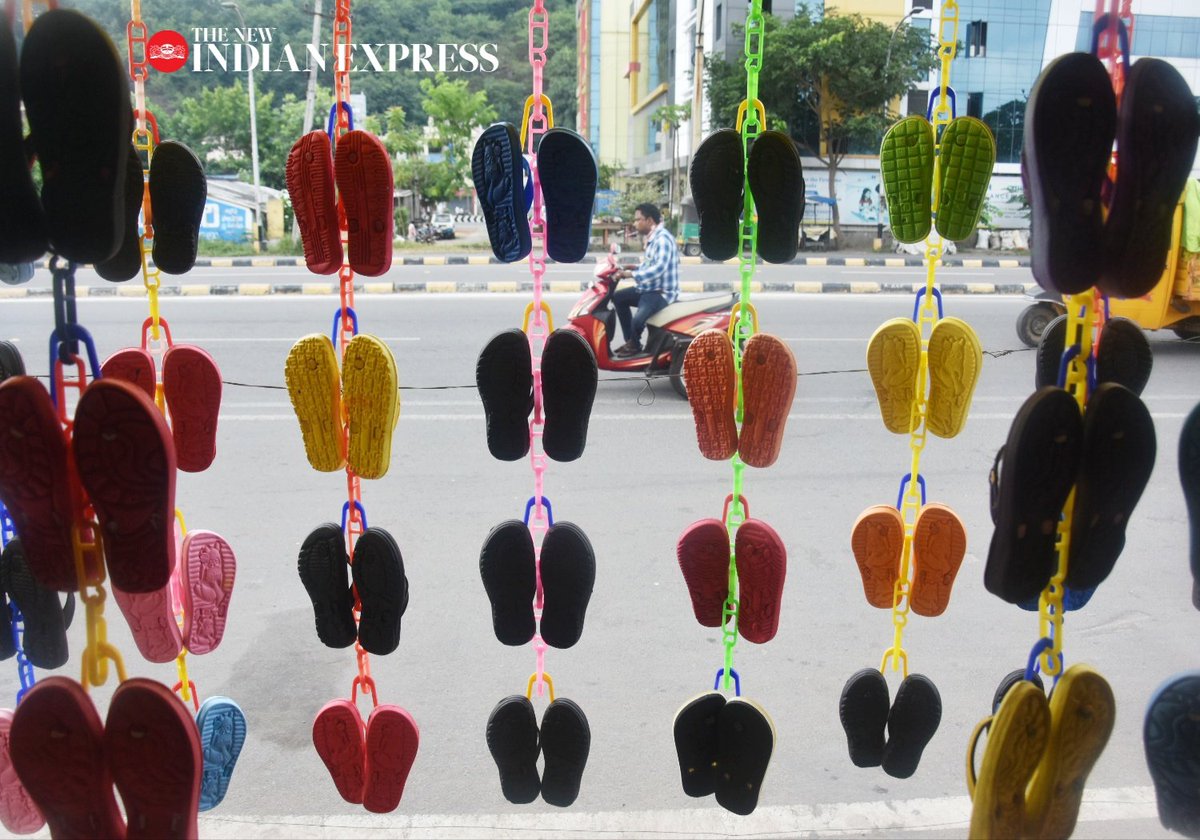 A #street #vendor displays slippers for sale following #unlock4guidelines during #COVID-19 in #Vijayawada. @NewIndianXpress @xpressandhra @Kalyan_TNIE @shibasahu2012