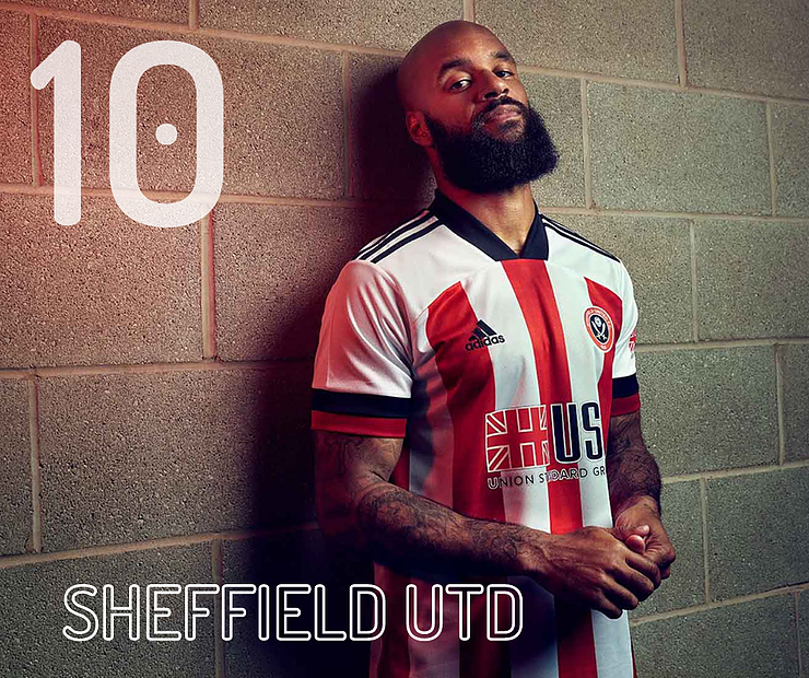 10. The red and white stripes with black trim is a classic look. The Blades would look even sharper if it weren't for the strange collar that Adidas have introduced this term. Likewise the sponsor clashes with the colours.