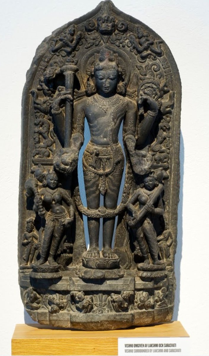 This 1000 year Pala era murthi of Maha Vishnu now lies smuggled away in the museum of far eastern antiquities in Stockholm, Sweden.The upper right arm wields the Kaumodaki, upper left the Sudarshana, lower right the padma & lower left arm is damaged.  https://artsandculture.google.com/asset/hindu-sculpture-black-basalt-unknown/2wGq3JPFocVxUg?hl=en