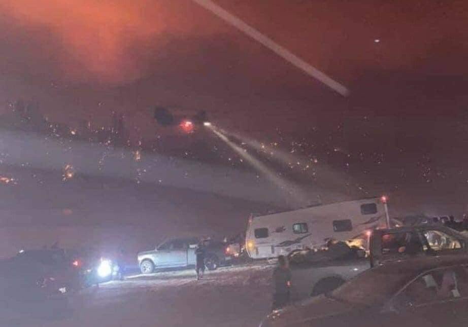 Flying using night vision through high cross winds, smoke, burning embers and rough terrain, the CA NG took off and landed several times, rescuing all 200 people. Their efforts were captured through their own pictures-it looks positively apocalyptic.“