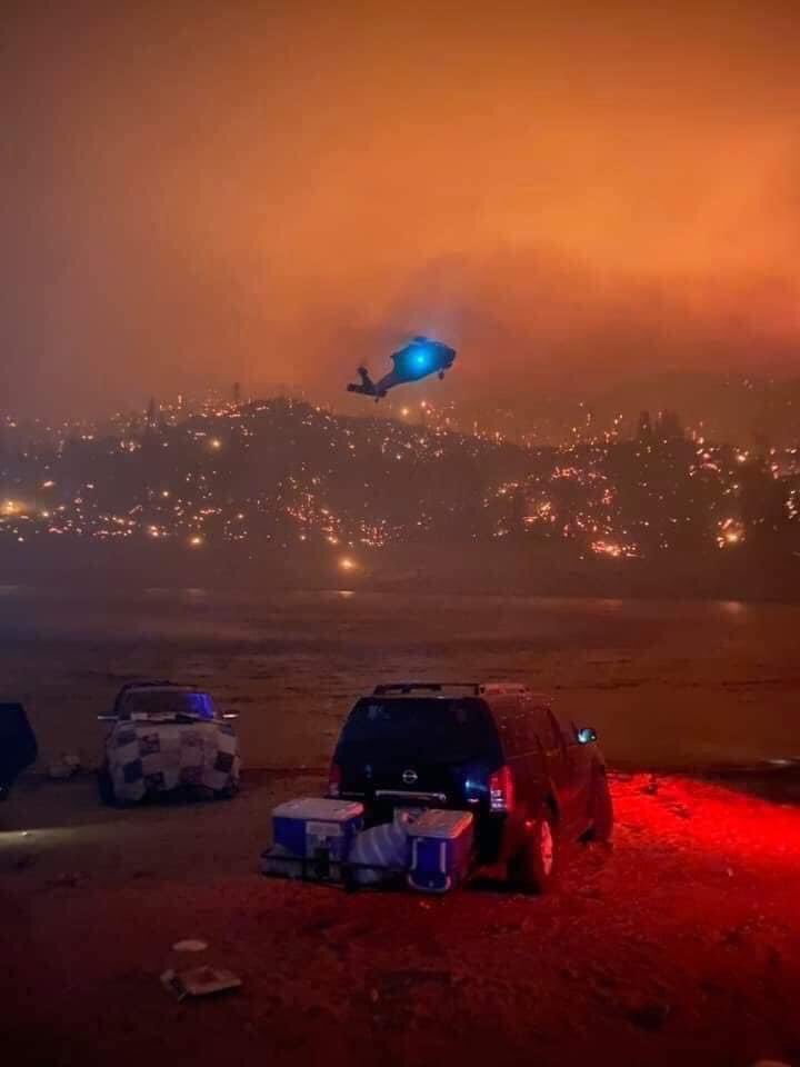 Flying using night vision through high cross winds, smoke, burning embers and rough terrain, the CA NG took off and landed several times, rescuing all 200 people. Their efforts were captured through their own pictures-it looks positively apocalyptic.“