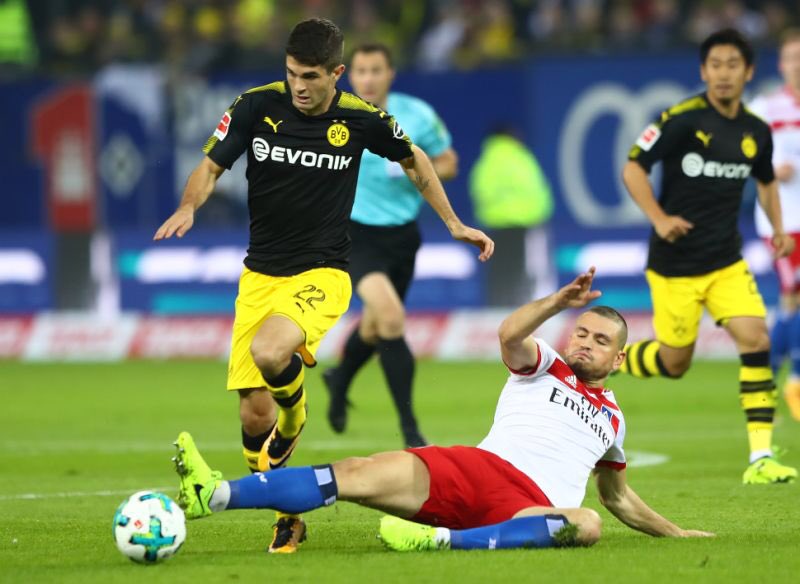 Pulisic scored his first Bundesliga goal for Borussia Dortmund on April 17, opening the scoring in a 3–0 home win against Hamburger SV. It made him the youngest non-German and fourth-youngest player to score a goal in the Bundesliga, at just 17 years and 212 days old.