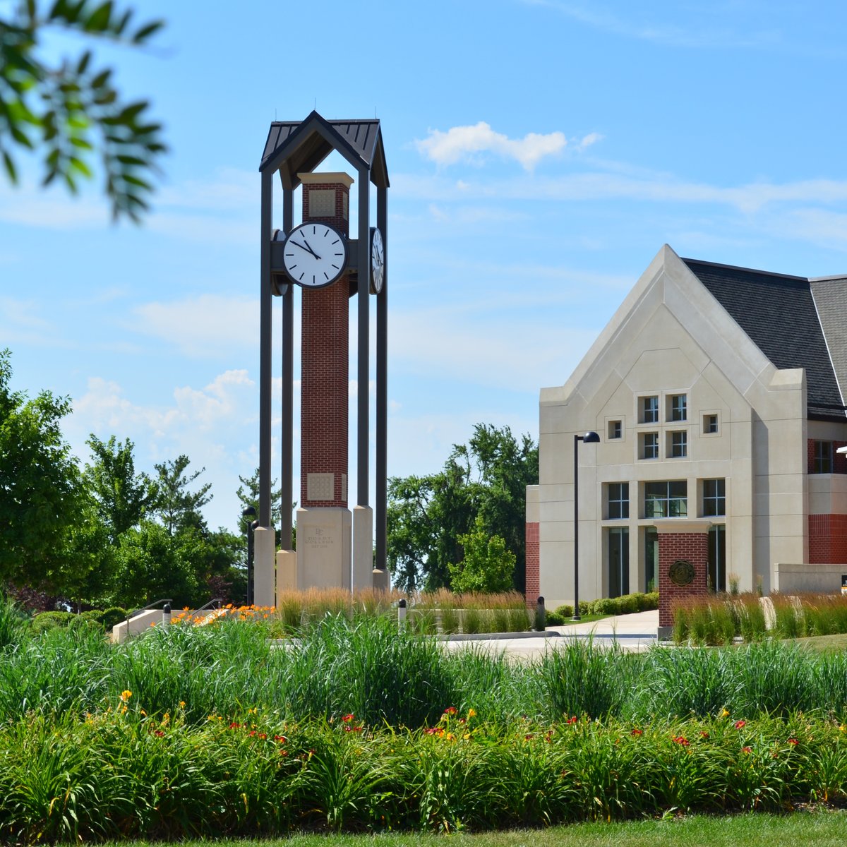 thinkConfluence's tweet photo. #ConfluenceTBT: The clock tower at Dordt University in Sioux Center, IA was designed as a component to a larger, central gathering space, where students can congregate, socialize and reflect. https://t.co/dQSRHP0NWD