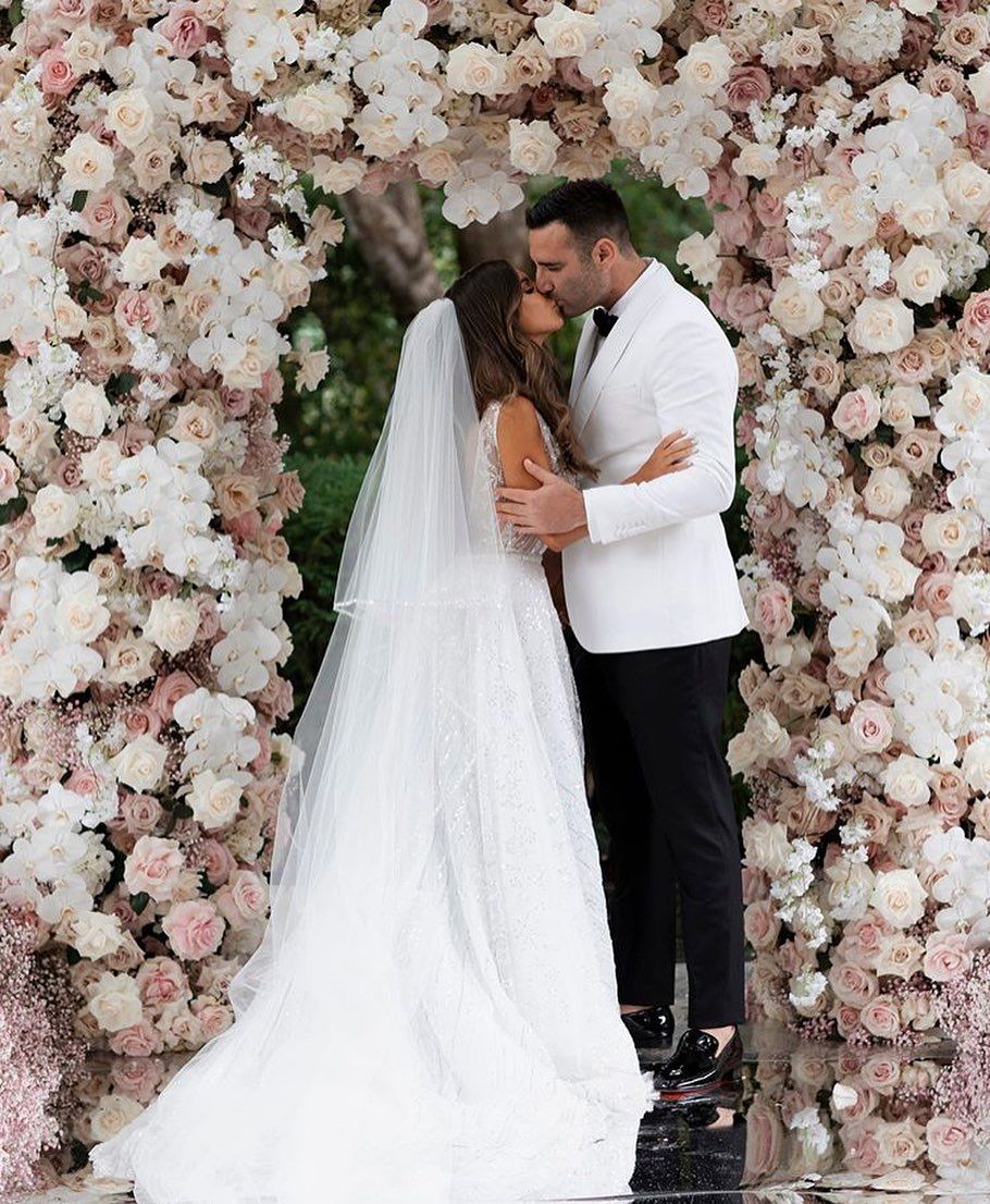 An abundance of pastel & white florals create the most perfect ceremony backdrop!

#RockHer #weddingdecor #weddinginspo #weddingflowers #weddingdecorations #weddingalter #brideandgroom #justmarried