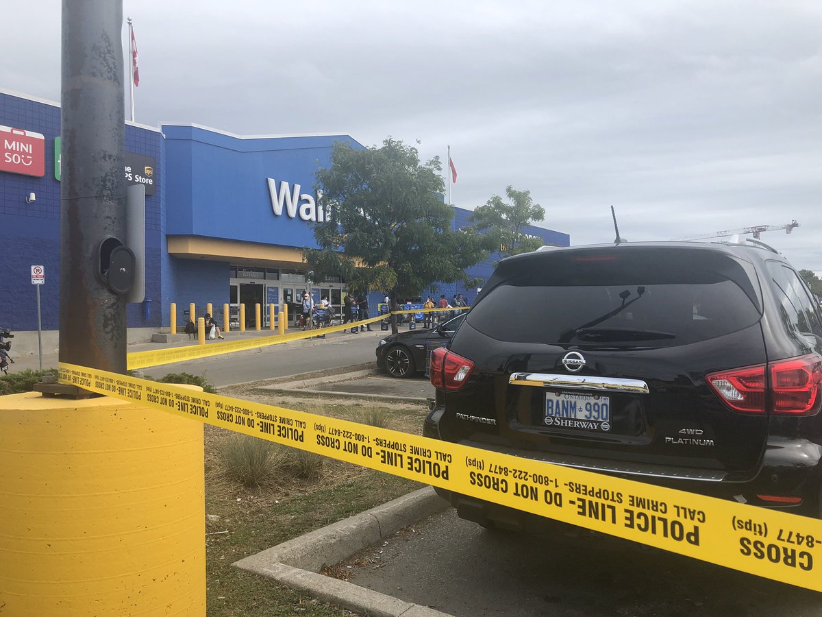 angelinaaking's tweet photo. A man is dead after a shooting in the Walmart parking lot at St. Clair and Runnymede. Witnesses say they saw a white SUV squeal away — a vehicle police are now looking for — and a body on the ground. https://t.co/ttgJAITUkl
