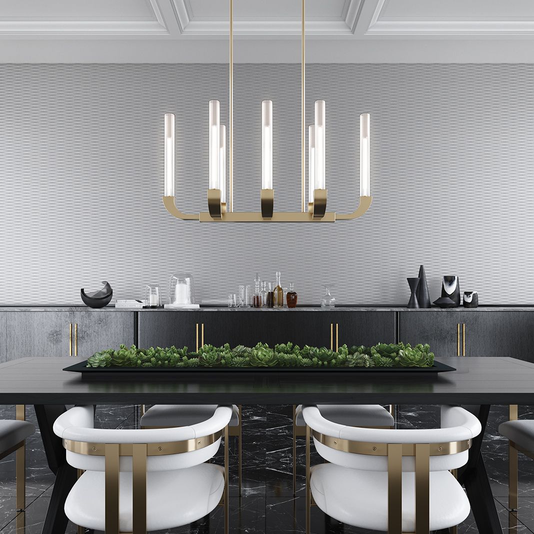 Champagne is the drink of celebration so it’s only fitting that the champagne flute inspired our most celebratory fixture. Softly curved arms hold ribbed glass tubes in a sophisticated frame. How many fire emojis does the triumphant Flute chandelier deserve? #aloralighting