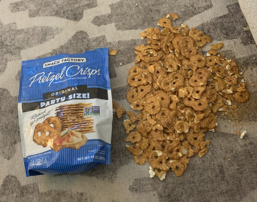 JarridSmith's tweet photo. We love @PretzelCrisps in our home. Usually we put them in a bowl, but if we’re really craving them we’ll eat them straight from the bag. I caught my 2 y/o son enjoying them in a new way. #parenting #snackgenius https://t.co/SzUHwcIfft