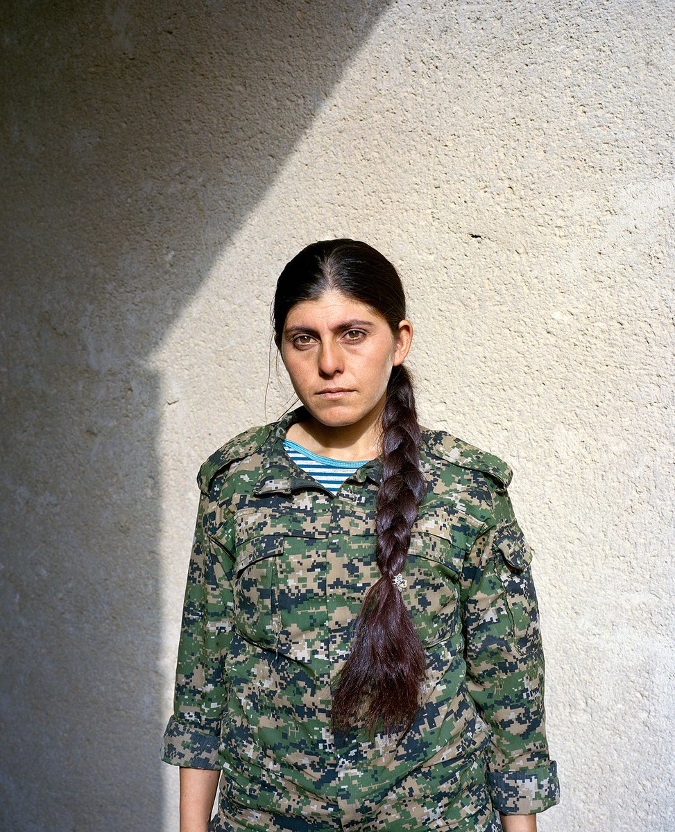 Dicle, 23 years old. Dicle appears to be much older than she really is, as many of the fighters do. She has been a member of the resistance for three years; before that, she fought in the mountains of Kurdistan. © Sonja Hamad