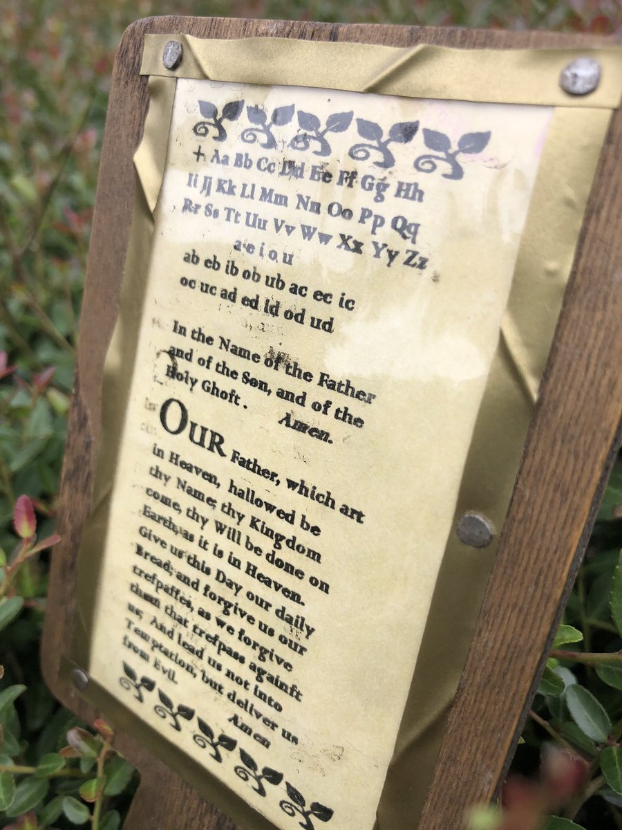 The Hornbook was used to teach children the alphabet &amp; was popular from the 1500s to the 1800s. A piece of paper (with letters &amp; sometimes a bible passage) was pasted to a hard backing and covered with a thin sheet made from horn (which can look like plastic to the modern eye!)