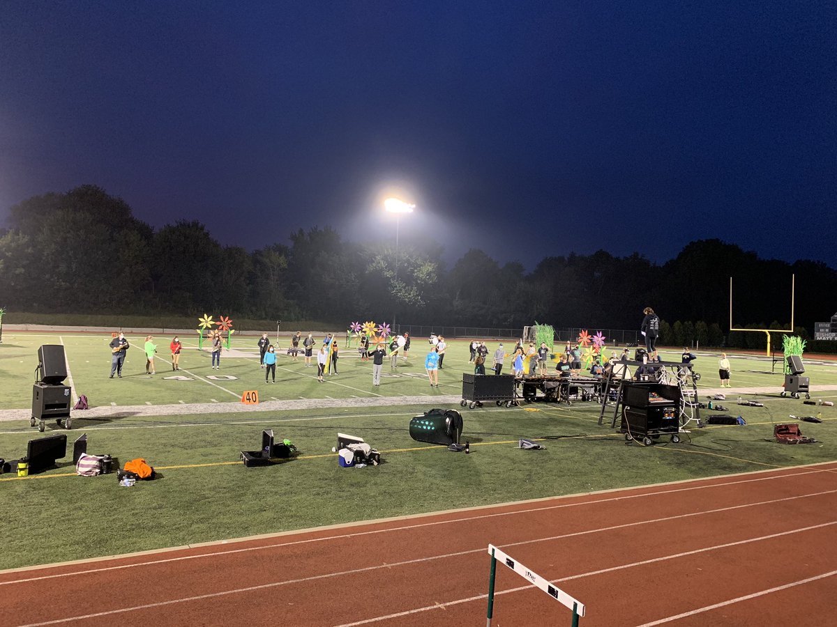provi_band's tweet photo. Rehearsing for the first Virtual Competition this weekend. Feels good to be under the lights again. #marchingceltics #pchs https://t.co/9evsbNEdQz