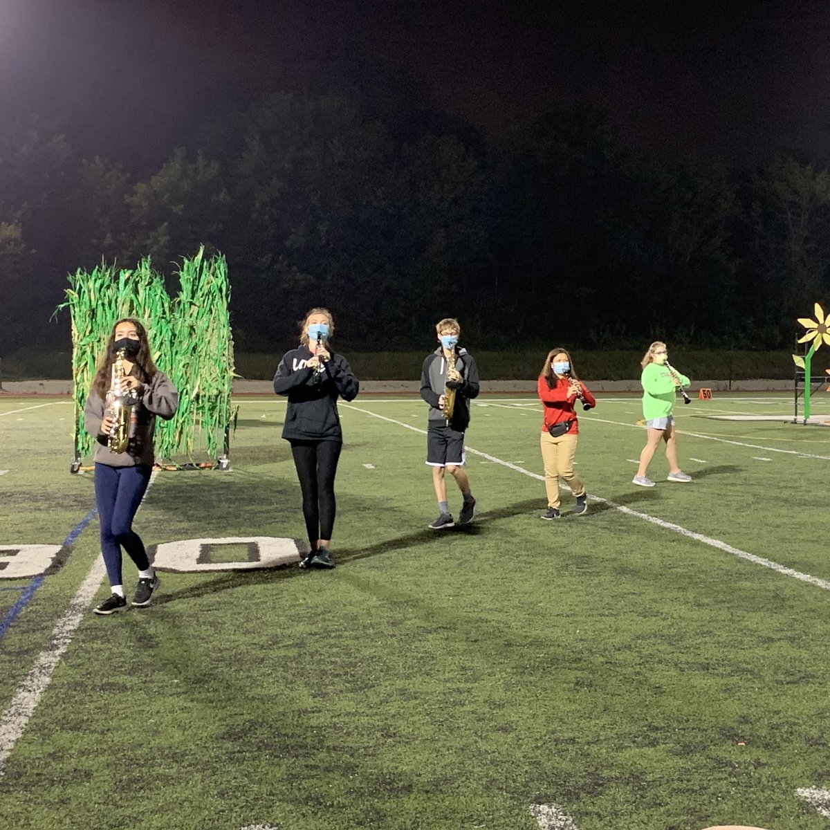 provi_band's tweet photo. Rehearsing for the first Virtual Competition this weekend. Feels good to be under the lights again. #marchingceltics #pchs https://t.co/9evsbNEdQz