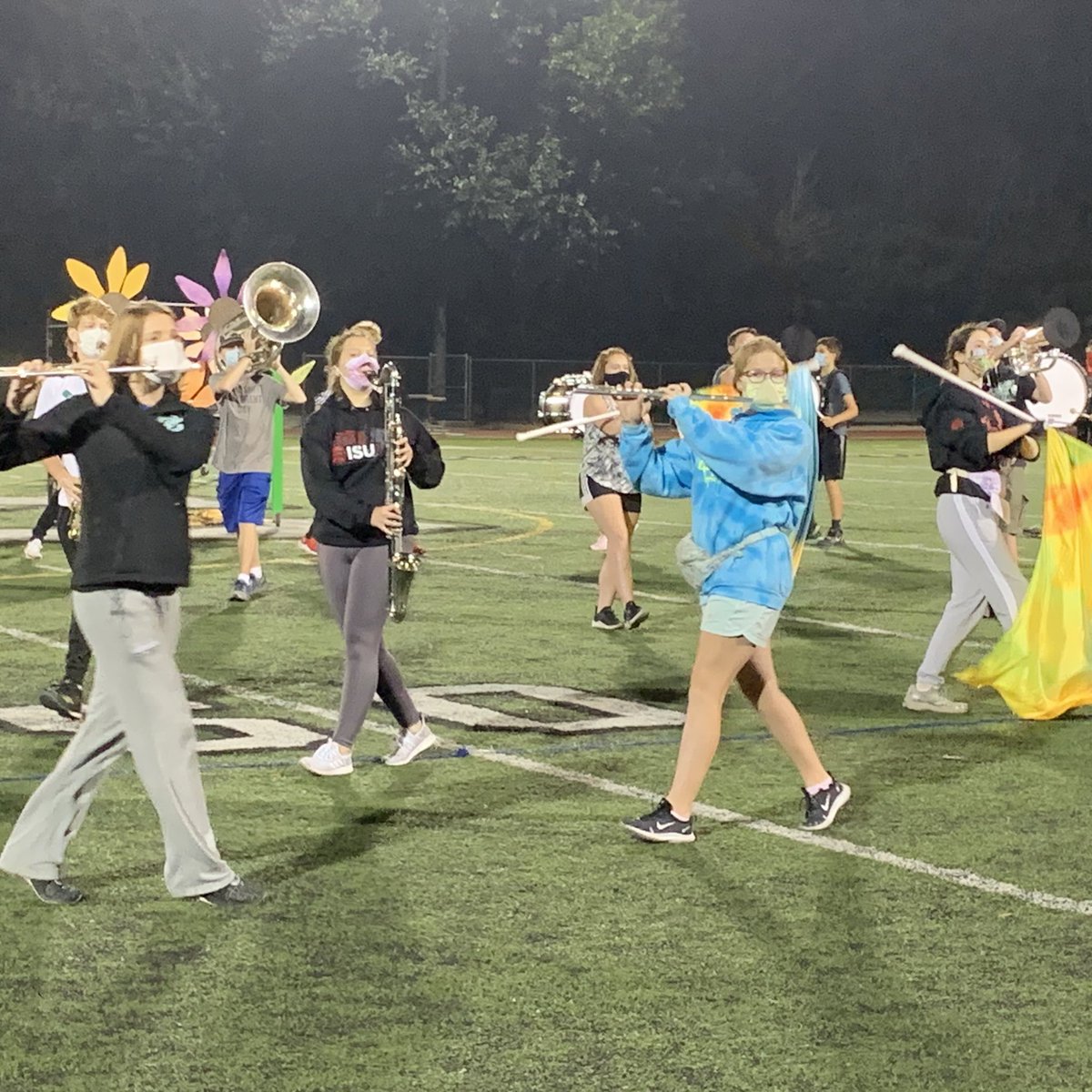 provi_band's tweet photo. Rehearsing for the first Virtual Competition this weekend. Feels good to be under the lights again. #marchingceltics #pchs https://t.co/9evsbNEdQz