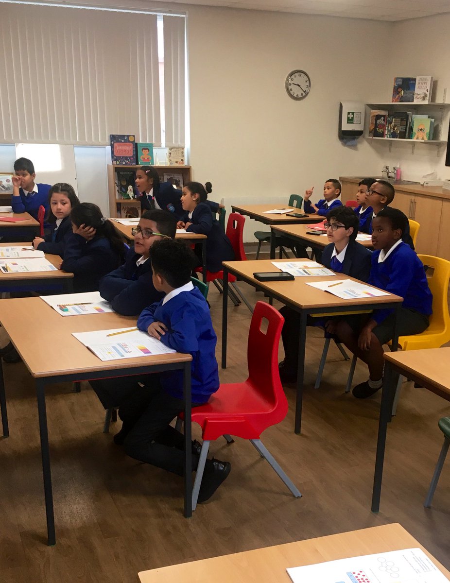 5G discussing place value this morning. I love how well my class work in pairs!