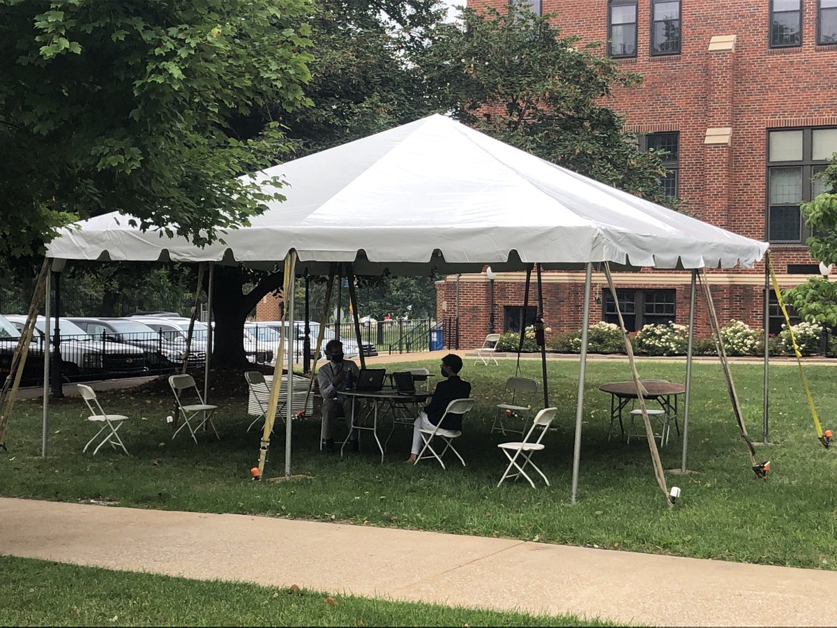 Sluhpresident's tweet photo. Our Class of 2021 banner says it all! Tents were a big hit at lunch today (pics from this morning). The Class of 2024 members I spoke with seem to be having a great day. Life & energy returns to Backer Memorial Campus. #blessedtobeback #AMDG https://t.co/rpSrz1y2Ud