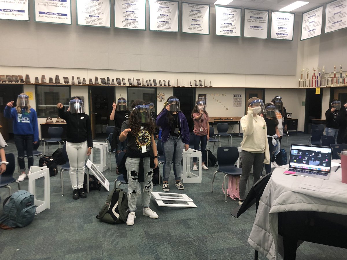 MsEricson's tweet photo. Masks on, shields on, we are SINGING!!! We are so happy singing together again! #cfb #leadtheway #TogetherWeCan @KOSullivanCFB thank you fine arts for providing us with a these face shields to protect us!!! https://t.co/g8E1TrGKHG