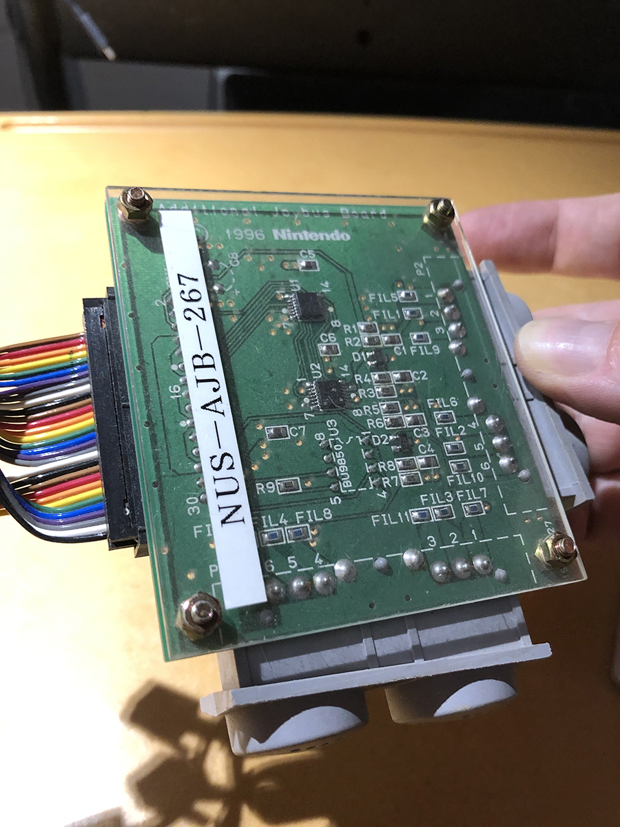This is an additional joystick bus for the N64 dev board that went inside an SGI Indy workstation. The early controllers used RJ11, and when they switched to the final connector, Nintendo sent these little boards to developers.  #gamedev  #nintendo