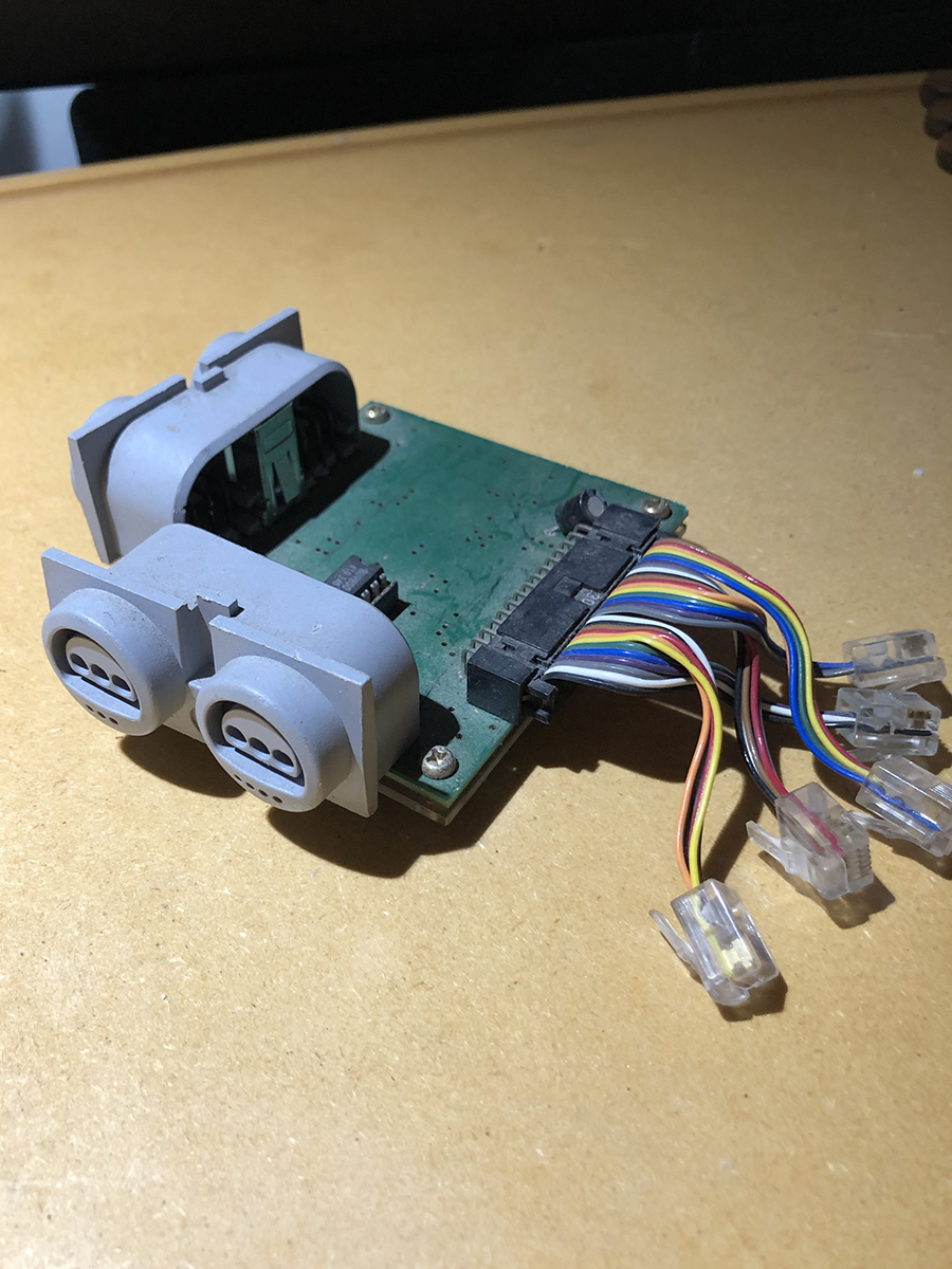This is an additional joystick bus for the N64 dev board that went inside an SGI Indy workstation. The early controllers used RJ11, and when they switched to the final connector, Nintendo sent these little boards to developers.  #gamedev  #nintendo