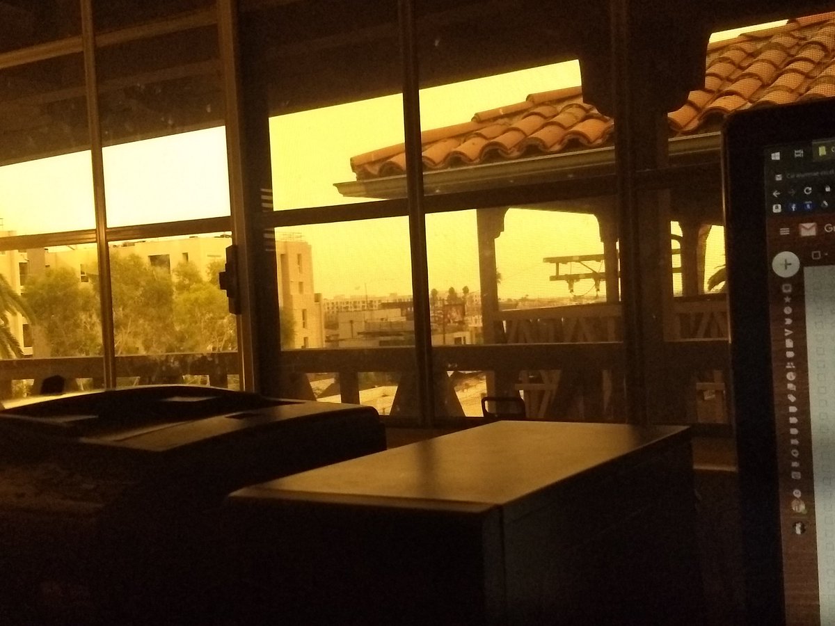 Focusing on work with this sky staring at me through the window is tough tbh. This yellow fog that rubs its back upon the window-panes is the mustard gas of my time, rolling out from 3 million dead acres to slide along the street. This is a TS Eliot sky and I have to do emails