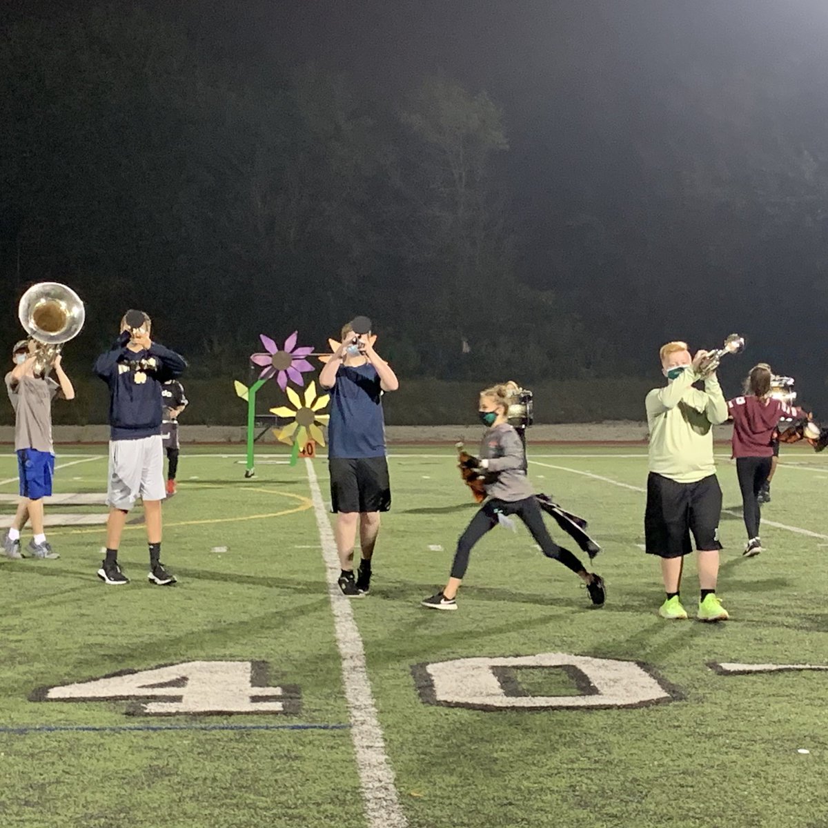 provi_band's tweet photo. Rehearsing for the first Virtual Competition this weekend. Feels good to be under the lights again. #MarchingCeltics #pchs https://t.co/AlRUTCcsXL