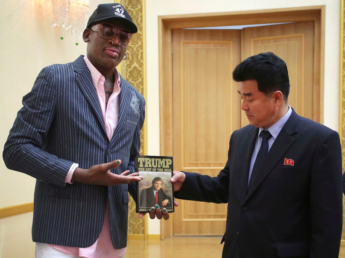 That was August 8, 2017.Guess who went to Pyongyang on June 13, 2017?Guess what Rodman presented to the North Koreans, who posed with it?