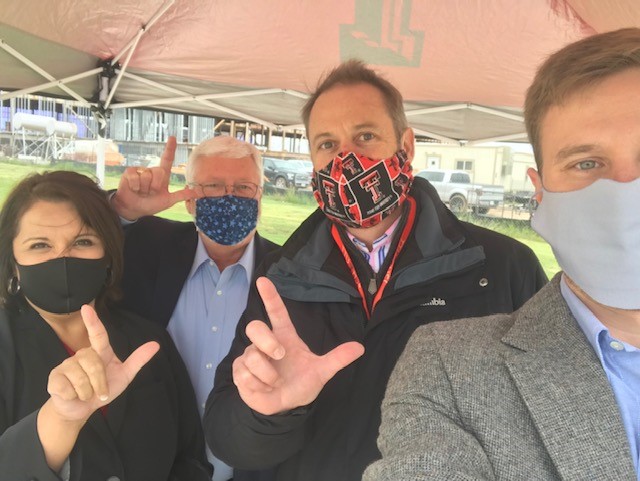 LubbockChamber's tweet photo. The @TTUVetMed is coming along nicely and a few of our staff had the honor of visiting the construction site and signing one of the beams earlier today. Thanks to Guy Loneragan, dean of the TTU Vet School in Amarillo, for taking time to visit with us. #WreckEm https://t.co/MgCASc0Kbe