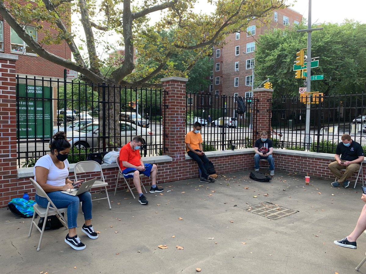 UFT's tweet image. .@UFT supporting educators at IS 230 in Jackson Heights. They will work outside until they know it is safe to go back into their school after a reported positive covid case. Results reported but no same day test and trace outreach. Unacceptable.