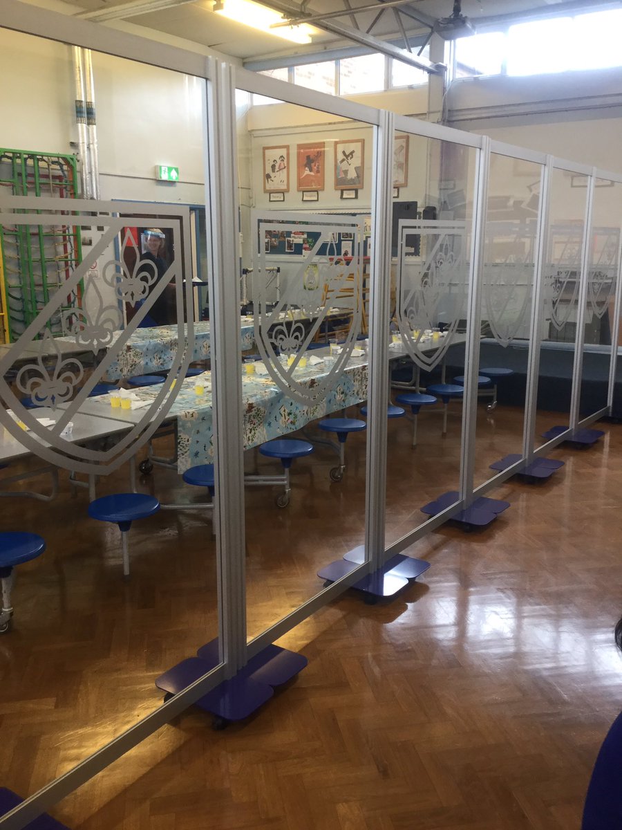RosaryRC's tweet photo. The school hall all ready for lunch. Look at our smart screens keeping all safe.@Exhib_Equip https://t.co/nV56TFioQF