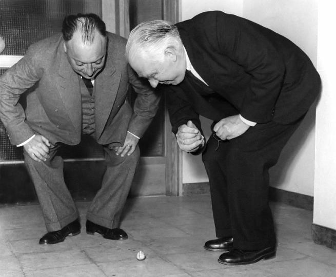 Physics Photo Of the Day:

Wolfgang Pauli and Niels Bohr demonstrating 'tippe top' toy at the inauguration of the new Institute of Physics at Lund; Sweden, July 1954.
