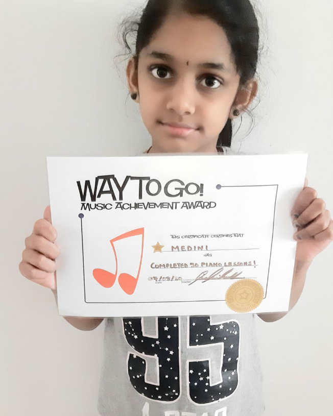 Medini with her 50 lesson certificate! Well done for completing 50 piano classes great work! 
#hikariprogressgoals #pianolessonsforkids #swindonpianolessons ⠀
#pianolessonsswindon  #onlinepianoteacher #pianolessonsonline #musiclessonsonline