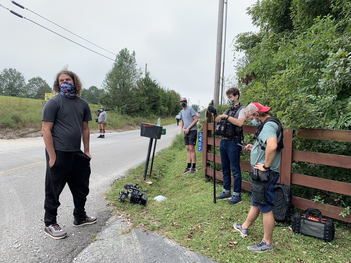 ShayMcAlisterTV's tweet photo. Crews from Netflix’s Tiger King are here at Wildlife in Need. Initially Tim Stark allowed them on property- but police made them come down here to the road. Stark is still on property- 100 minutes after he was court ordered to be gone. https://t.co/CWkVRNEUaT