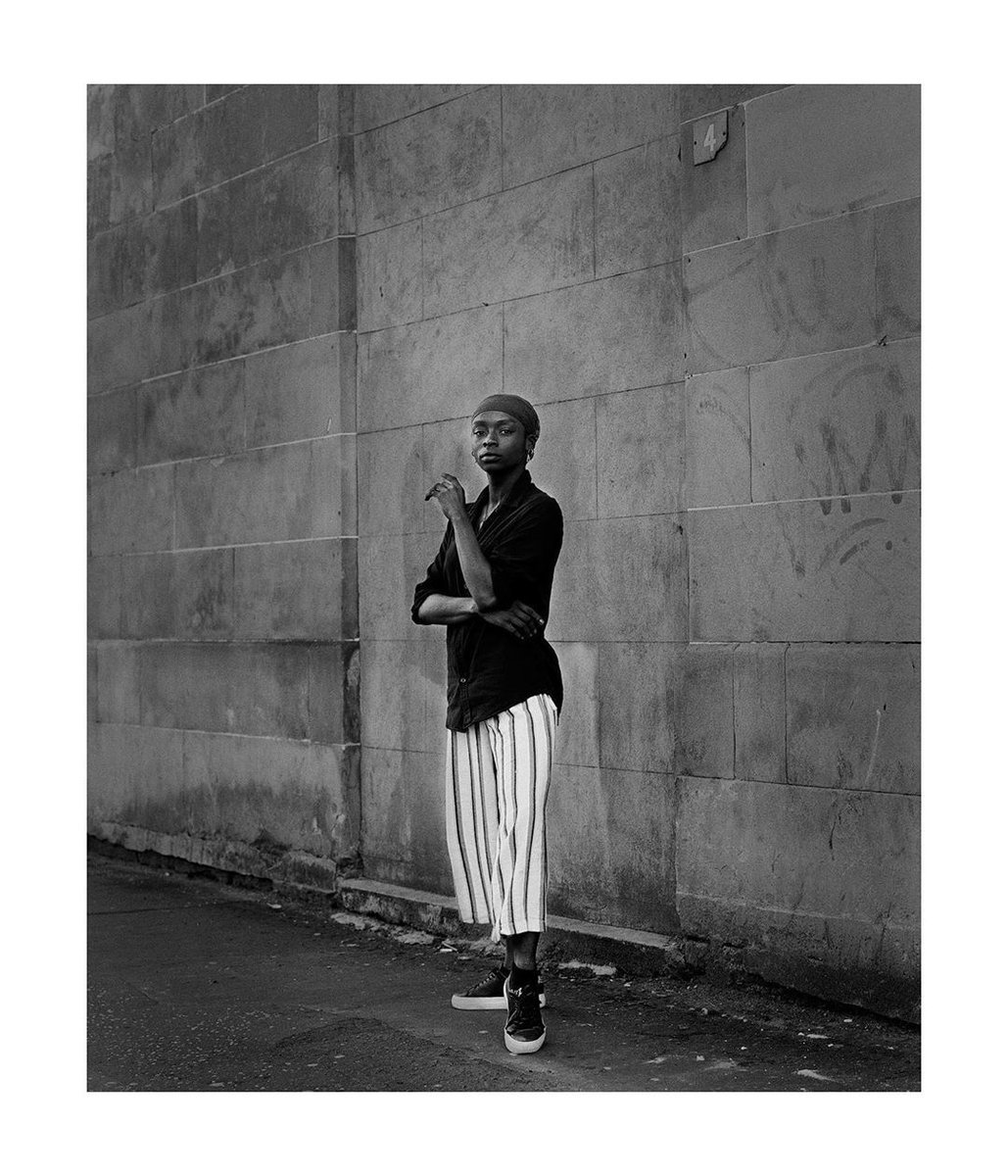 Rishan, Govanhill, Aug 2020..I caught a glimpse of Rishan sitting just off Pollokshaws rd during the exhibition and she kindly agreed to be photographed. Such grace, I could immediately tell she was a dancer -  @simonmurphy7